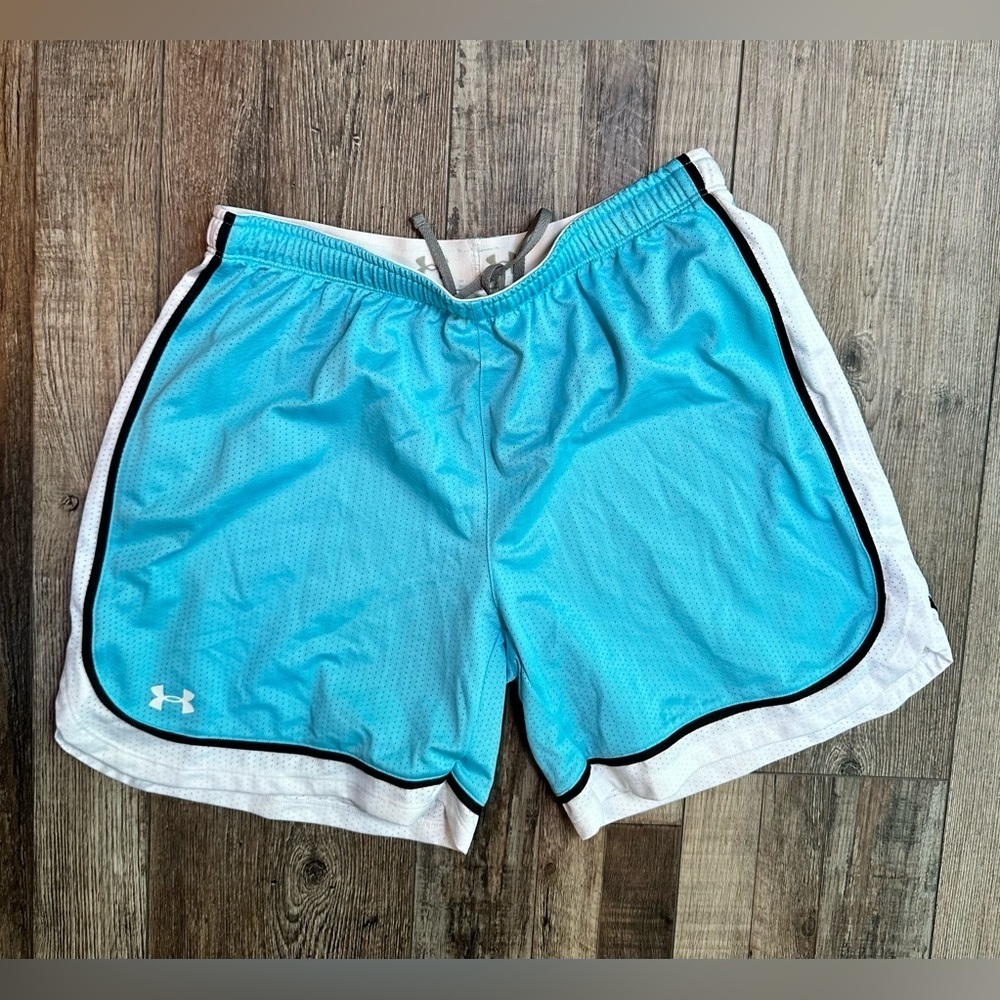Under Armour woman’s heat gear shorts in blue